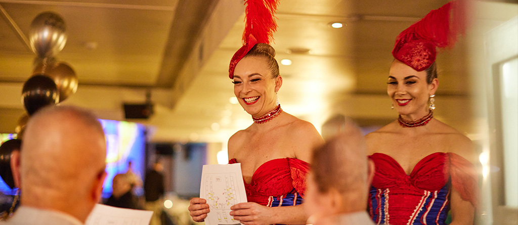 Showboat follies greeting the guests with a warm-hearted smile