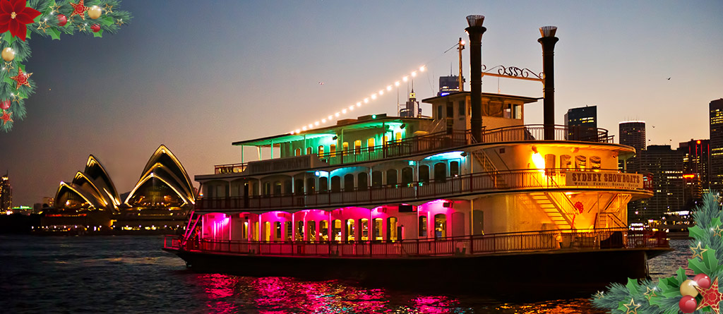 Showboat Christmas party dinner cruise drifting past the Opera House