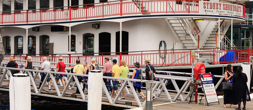 guests boarding the Sydney Showboat at King Street Wharf, Sydney