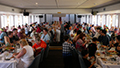Guests enjoying Christmas feast on the Christmas Day cruise.